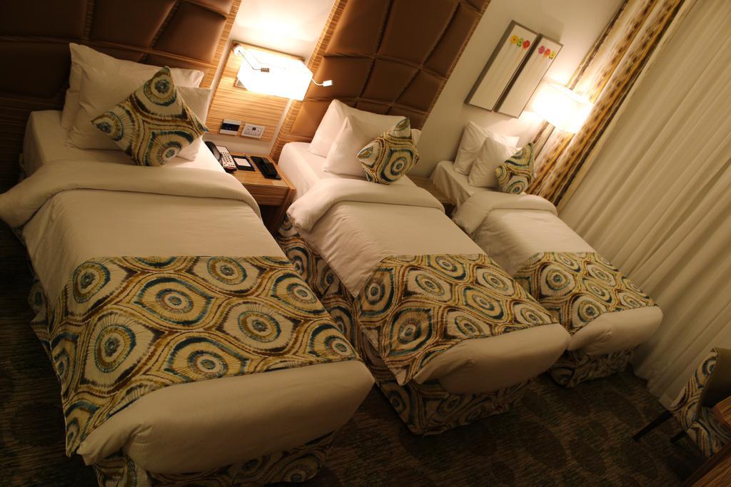 Deluxe Room with Three Single Beds